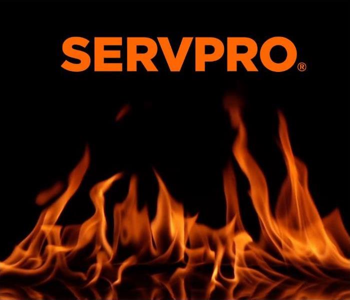 Flames rising with black background and SERVPRO logo 
